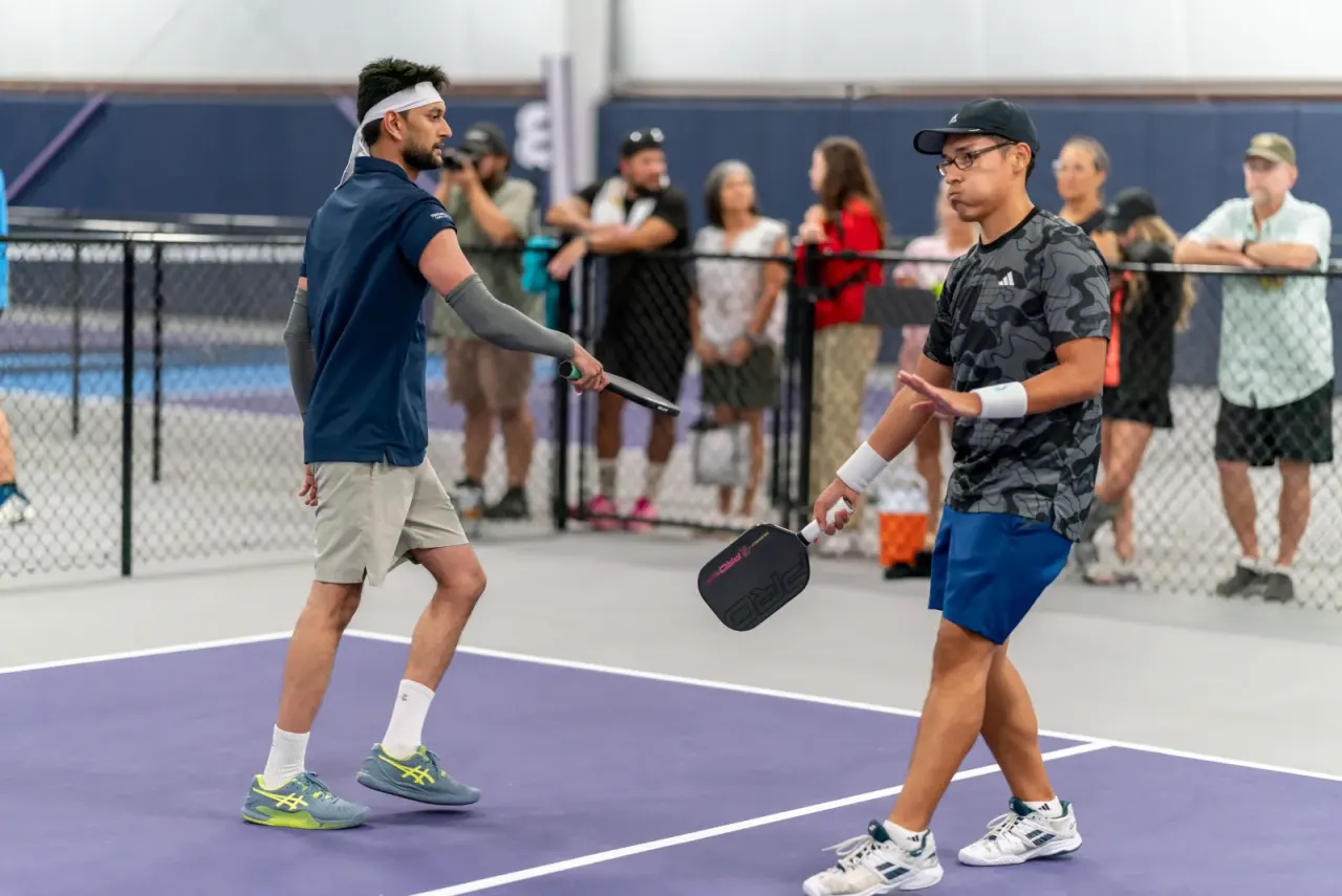 Crowd watches a tournament match at Pickleland
