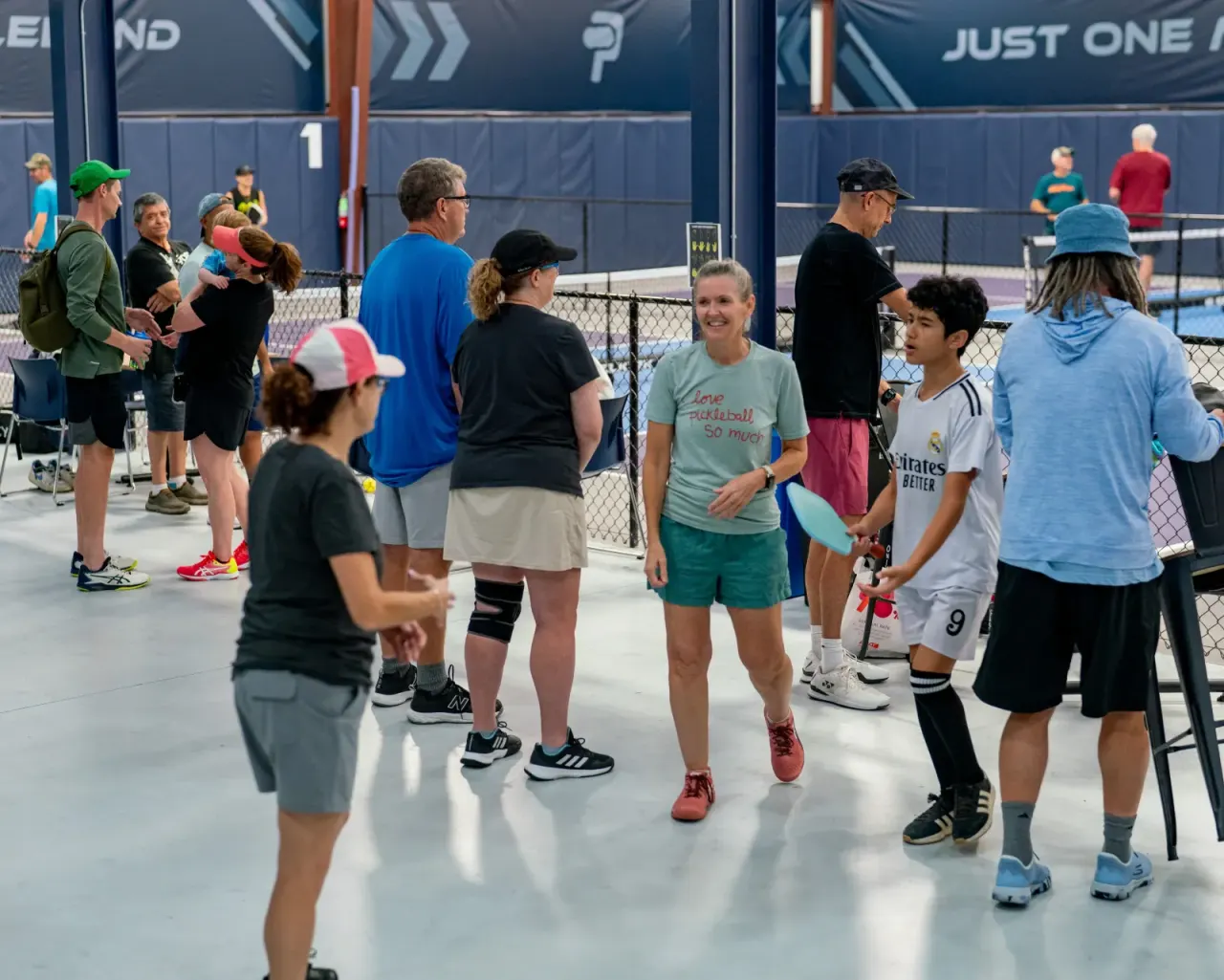 Open play session with a large group of players at Pickleland
