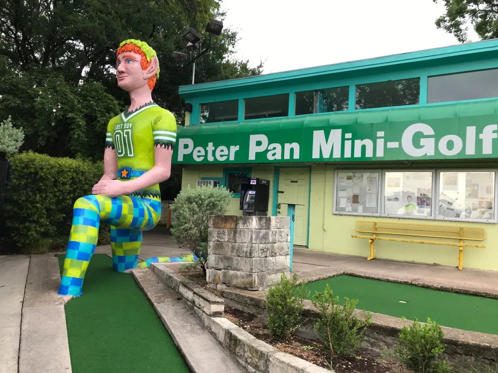 Whimsical statues on a hole at Peter Pan Mini Golf in Austin