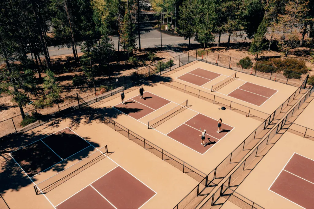 Pickleball courts surrounded by the natural scenery of Bend, Oregon